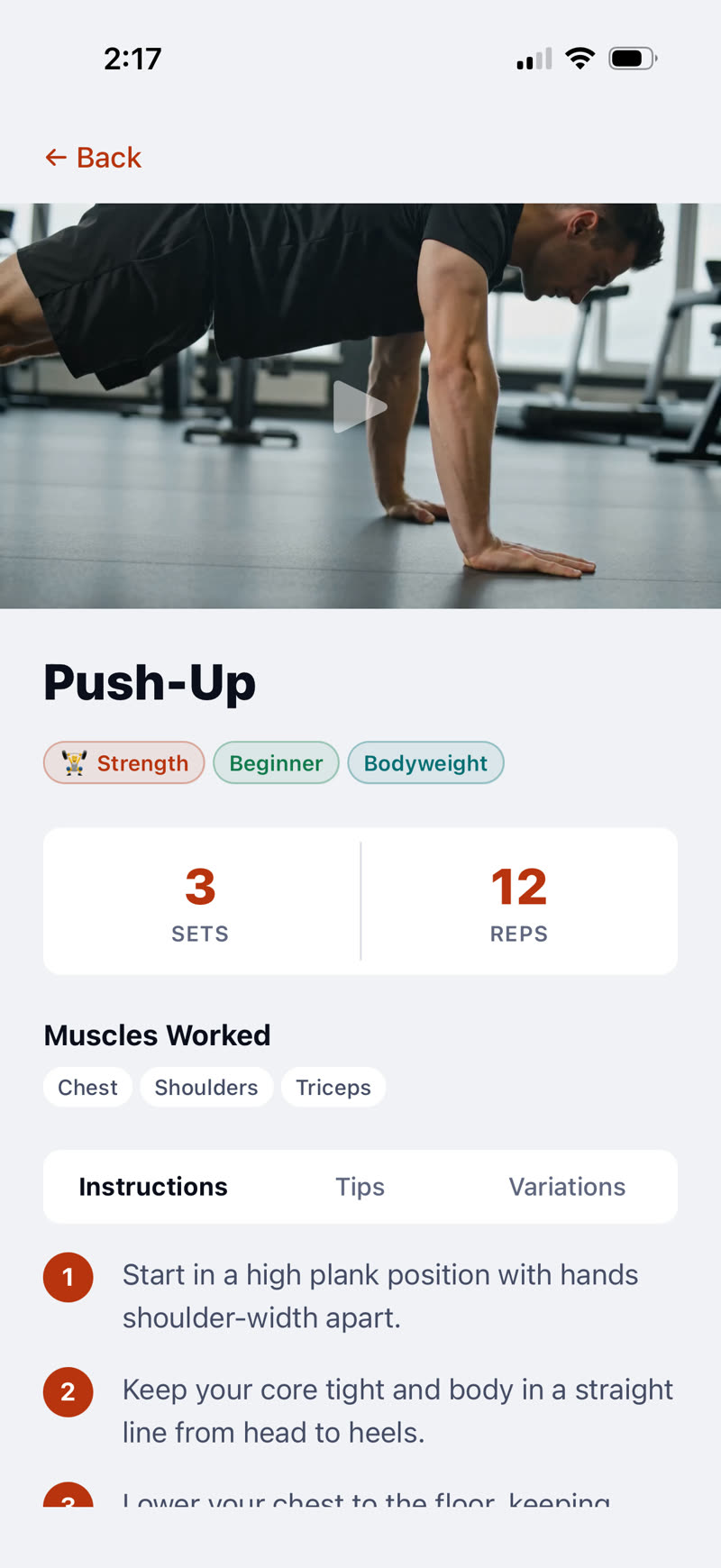A Fit Forged exercise page showing a push-up video with sets, reps and tips